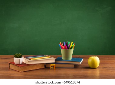 Back To School Concepty With Clear Blackboard Background, Desk, Items