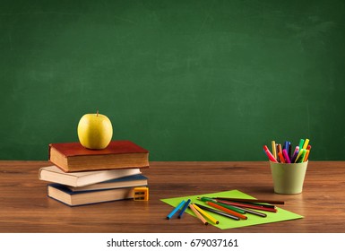 Back To School Concepty With Clear Blackboard Background, Desk, Items