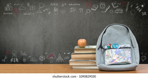 Back To School, Education Concept With Books, Textbooks, Backpack And Stationery Supplies On Classroom Desk With Teacher's Chalkboard Background With Educational Doodle For New Academic Year Begin 