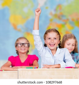 Back To School - Elementary School Pupil Raising Hand