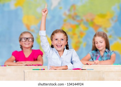 Back To School - Elementary School Pupil Raising Hand