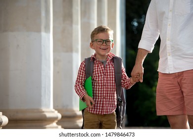 Back To School. Father Leaves Child In School Building. First Day Of Fall. Dad Saying Goodbye To Son. Parent Leads Child To Study. 