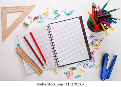 Back To School. Flat Lay Photo With Copybook, Yearbook And School Supplies