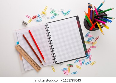 Back To School. Flat Lay Photo With Copybook, Yearbook And School Supplies