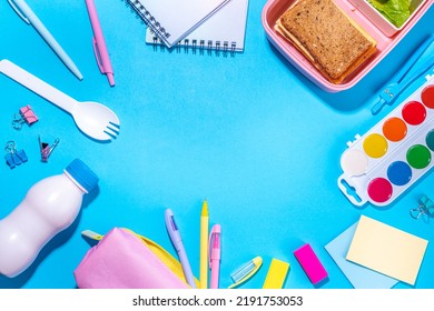 Back To School Flatlay Background. Pink Pencil Case With Various School Stationery On High-colored Bright Background