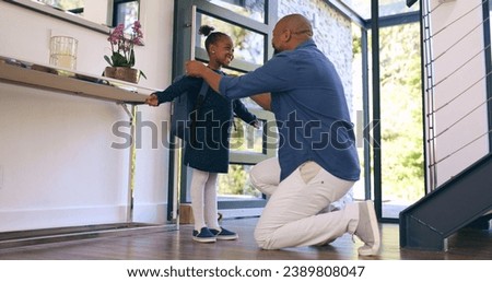 Back to school, getting ready and a girl student with her dad in their apartment together to say goodbye. Black family, kids and a man parent helping his daughter with her backpack while leaving home