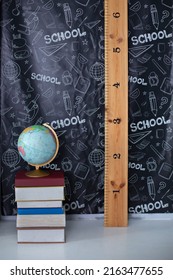 Back To School. Interior Of Elementary School. Chalkboard, Books, Globe And Stationery On Classroom. Teachers Day Concept. Empty Classroom With Blackboard. Kindergarten. Interior Of Children's Room