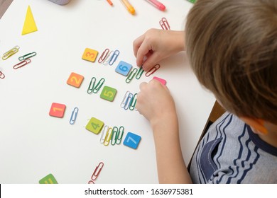 Back To School. Little Boy Child Preparing For Elementary School Doing Simple Math Exercises. Mathematics