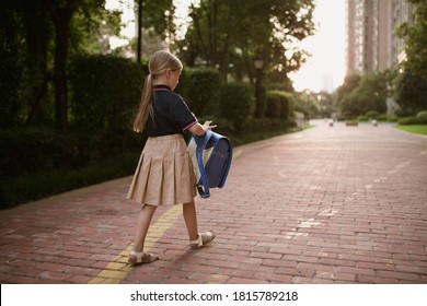 Back to school. Little girl from elementary school outdoor. Kid going learn new things 1th september