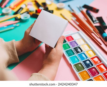 Back to school. Panoramic education banner. Top view, flat lay. Colorful supplies on table, colored paper. Children's creativity concept. Preschool study, development. Accessories for the schoolroom. - Powered by Shutterstock