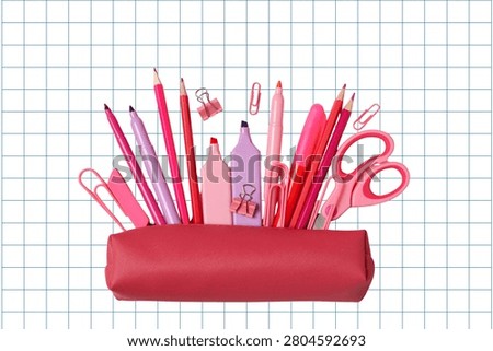 Back to school, Pencil case filled with vibrant pink school supplies ready for learning.