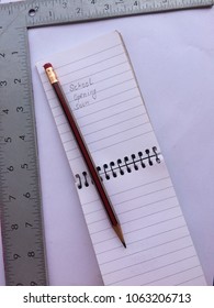 back to school, school study material , scetch pen pencils and small clips in image with notebook