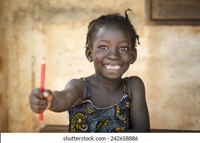 Back To School Symbol - African Girl Toothy Huge Smile Showing Red Pencil