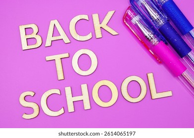 back to school write between school supplies