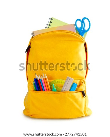 Back to school,  yellow backpack isolated on white, filled with school supplies. Pencils, scissors, and notebooks peek out. Perfect for the start of the school year.