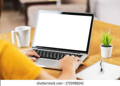 Back Side Of Asian Business Woman Using Laptop With White Screen For Creative And Design In Modern Of House, Working From Home And Stay At Home When Covid-19 Outbreak,blank Screen Mockup Copy Space