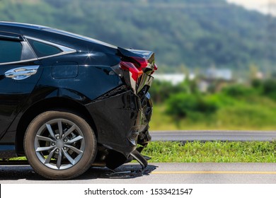 Back side of black car get damaged by accident. Right empty space after crash for text or advertisement design - Shutterstock ID 1533421547