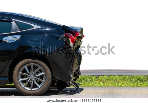 Back side of black car\
get damaged by accident on the road. Isolated on white. Saved with\
clipping path