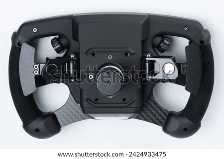 Back side of formula steering wheel with shifter isolated