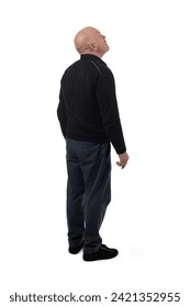 back side view of a man looking up on white background