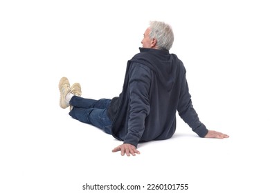 back side view of a man sitting on the floor on white background