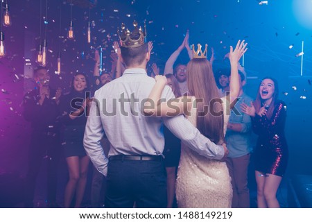 Back side view portrait of lovers have become king queen celebrating scream buddies enjoy dance floor