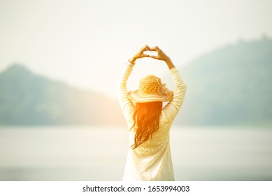 Back Side Woman Feeling Fresh Freedom Positive Energy Standing Grass Field Flower Meadow International Woman's Day 8 March. Cheerful Morning Relaxation Springtime Mountain View With Sunlight