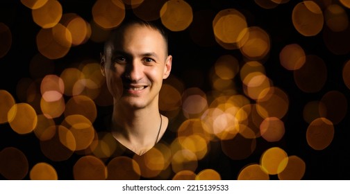 Back Silhouette Of Man Isolated On Magical Background For Halloween With Garlands, Bokeh Lights, Hanging Glowing Pumpkins, Smoke. Mystical Night Forest With Jack O Lantern. Copy Space