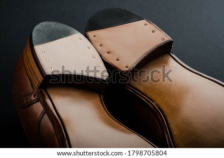 The back of the sole of a classic pair of shoes made of leather