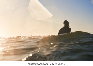 Back, sports and person in ocean for surfing, relax and balance for professional in training. Beach, water and waves with male surfer for fitness, practice and prepare on surfboard with mockup - Powered by Shutterstock