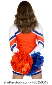 Back Of Teen Cheerleader Wearing An Orange Uniform Holding Blue And Orange Pom-poms