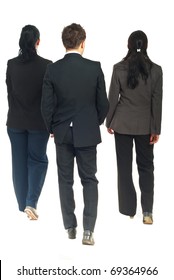 Back Of Three Business People Walking Isolated On White Background