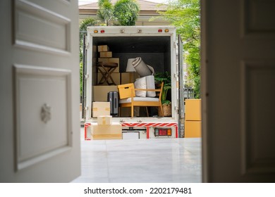 back of a truck carrying goods moving house - Shutterstock ID 2202179481