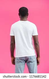 back view of african american man in casual clothing isolated on pink 