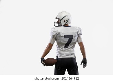Back view. American football player isolated on white studio background with copyspace for ad. Concept of sport, movement, achievements.