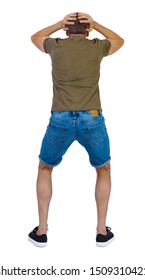 Back View Of Angry Young Man In Shorts. Rear View. Isolated Over White. Backside View Of Person.  Rear View People Collection. Isolated Over White Background. A Shocked Guy In Shorts Grabbed His Head.