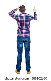 Back View Of Angry Young Man In Jeans And Checkered Shirt. Rear View. Isolated Over White. Backside View Of Person.  Rear View People Collection. Isolated Over White Background.