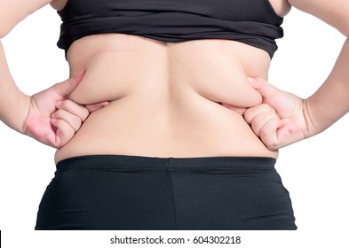 Back View. Asian Fat Women Has Overweight. She Used Hands Squeezing Excess Fat Of The Waist. Isolated On White Background. She Wants Lose Weight. Concept Of Surgery And Subcutaneous Fat Breakdown.