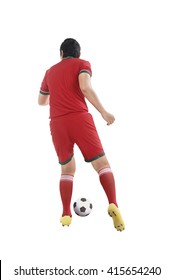 Back View Of Asian Football Player Kick Ball Isolated Over White Background