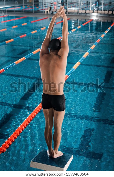 Back View Athletic Swimmer Standing Hands Stock Photo (Edit Now) 1599403504