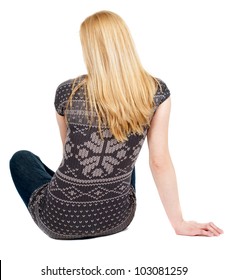 Back View Of Beautiful Young Woman Sitting On The Floor And Looks Into The Distance. Blonde Girl Relaxes. Rear View People Collection.  Backside View Of Person.  Isolated Over White Background.