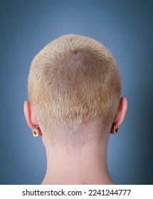 back view of blond short hair woman