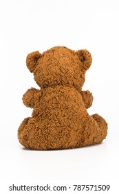 Back View Of Brown Teddy Bear On White Background. Cute Little Toy