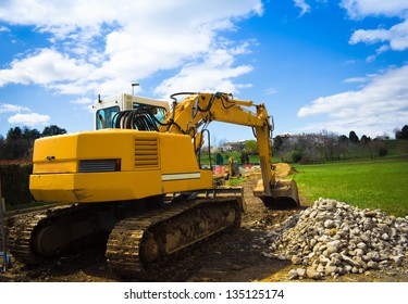 Back View Of A Bulldozer In A Sunny Day