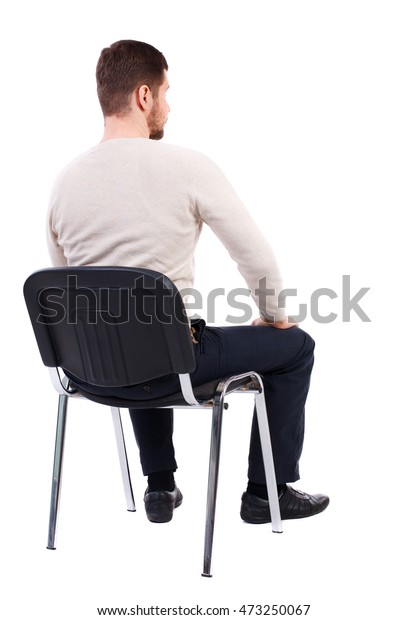 椅子に座っている実業家の後ろ姿 見ている実業家 Rear View Peopleコレクション 人の背景のビュー 白い背景に 白い暖かいセーターを着た髭を生やした男が座る の写真素材 今すぐ編集