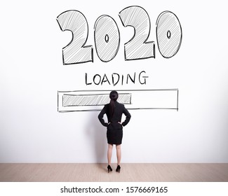 Back View Of Business Woman Look 2020 Text On White Wall Background