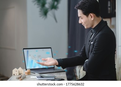 Back view of business woman talking to her colleagues about plan in video conference. Multiethnic business team using laptop for a online meeting in video call. Group of people smart working from home