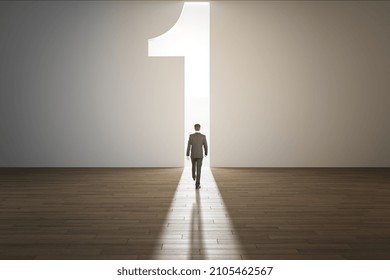 Back view of businessman in interior with concrete wall and wooden flooring walking towards abstract number one opening with daylight. Winner and success concept