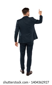 back view of businessman pointing with finger while standing isolated on white 