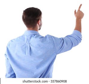 Back View Of Caucasian Young Man In A Blue Shirt Pointing, Isolated On White